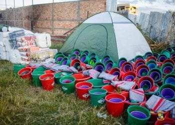CATASTROPHES – Les sinistrés d&rsquo;un incendie survenu dans la nuit du lundi à mardi à Andohatapenaka provisoirement installés sur un terrain vague du quartier